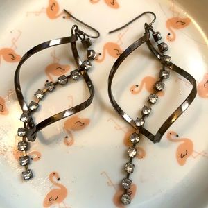 Black swirl earrings with gems